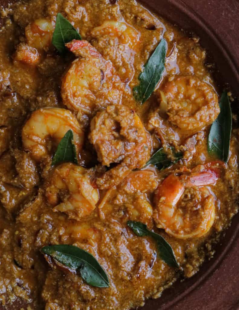 prawn korma, shrimp covered in thick korma gravy and served in a clay pot.