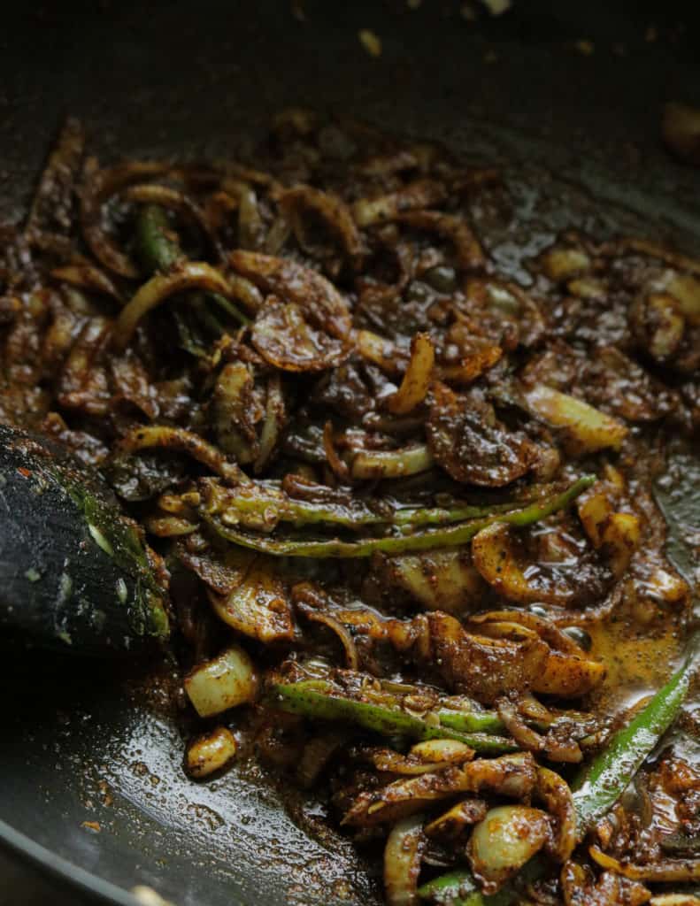 tempered ingredients with the curry powder to make the calamari curry.